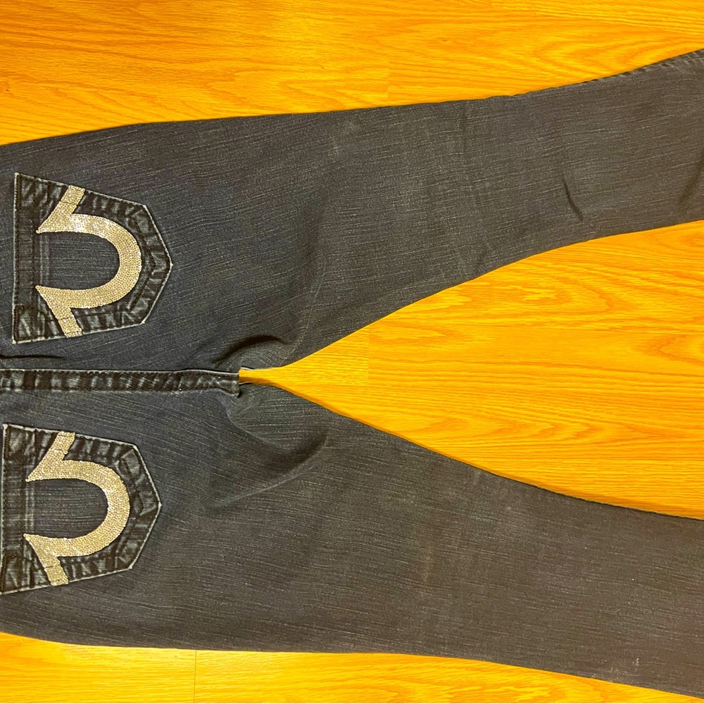 Dark blue bootcut True Religion jeans size 26/33” long.